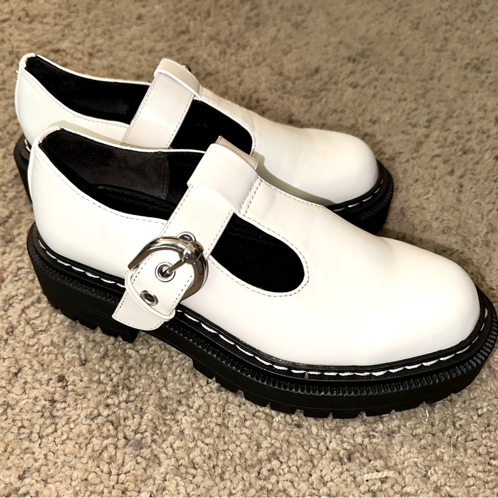 White Mary Jane’s size 6 and a half. Brand New!